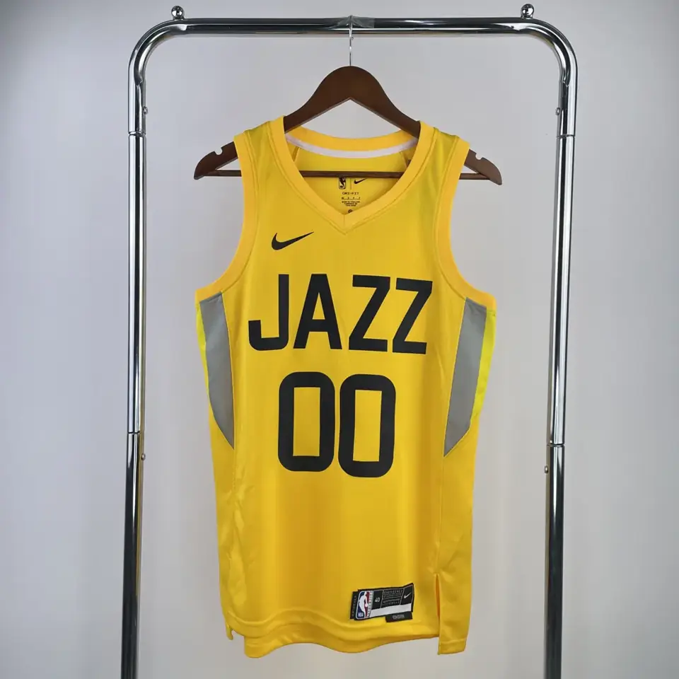 Temporada 23 Jazz visitante amarillo número 00 Clarkson