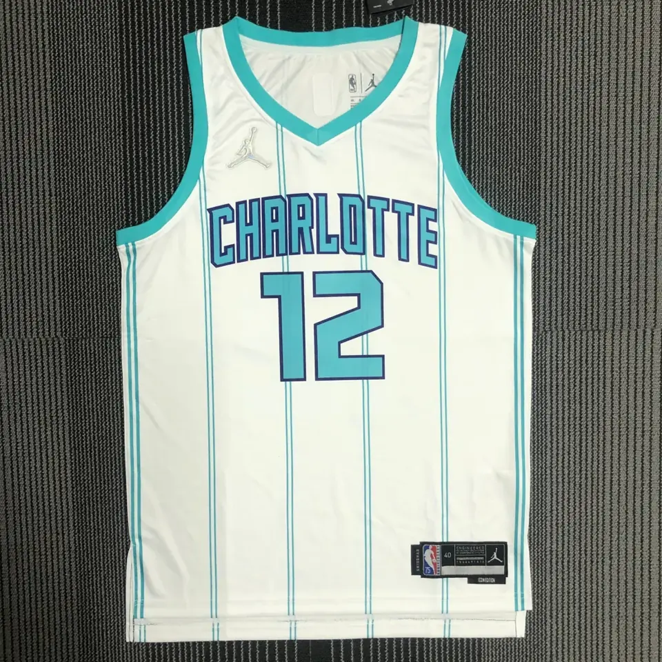 75 aniversario Hornets blanco número 12 Oubre