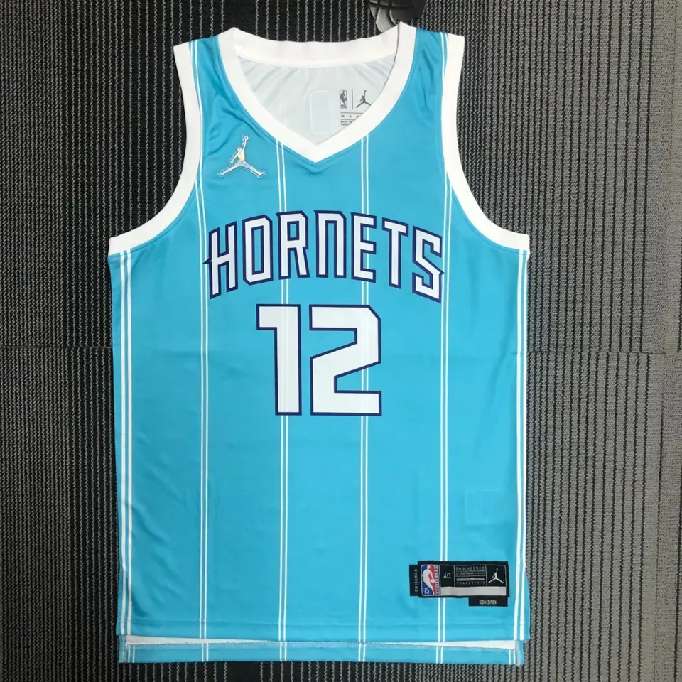 75 aniversario Hornets azul número 12 Oubre