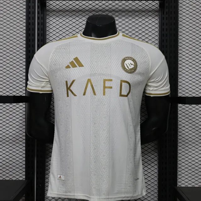 Versión jugador 26.27 Riad visitante con publicidad S a 3XL