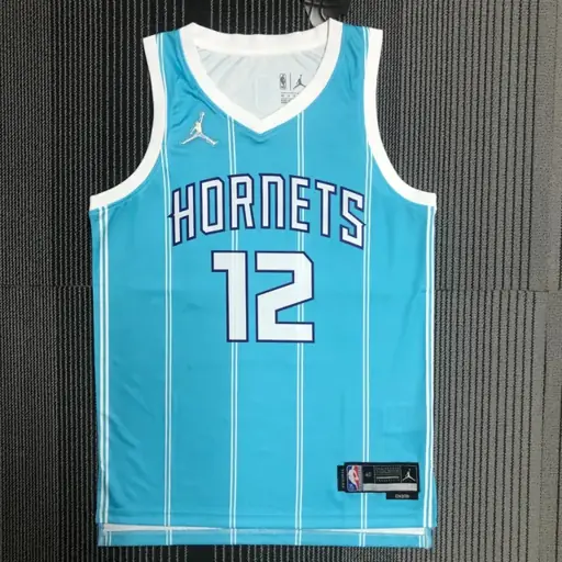 75 aniversario Hornets azul número 12 Oubre