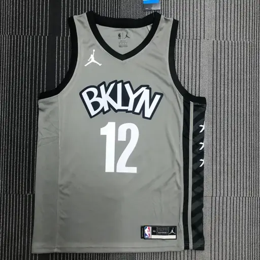 Nets modelo Jumpman gris número 12 Harris