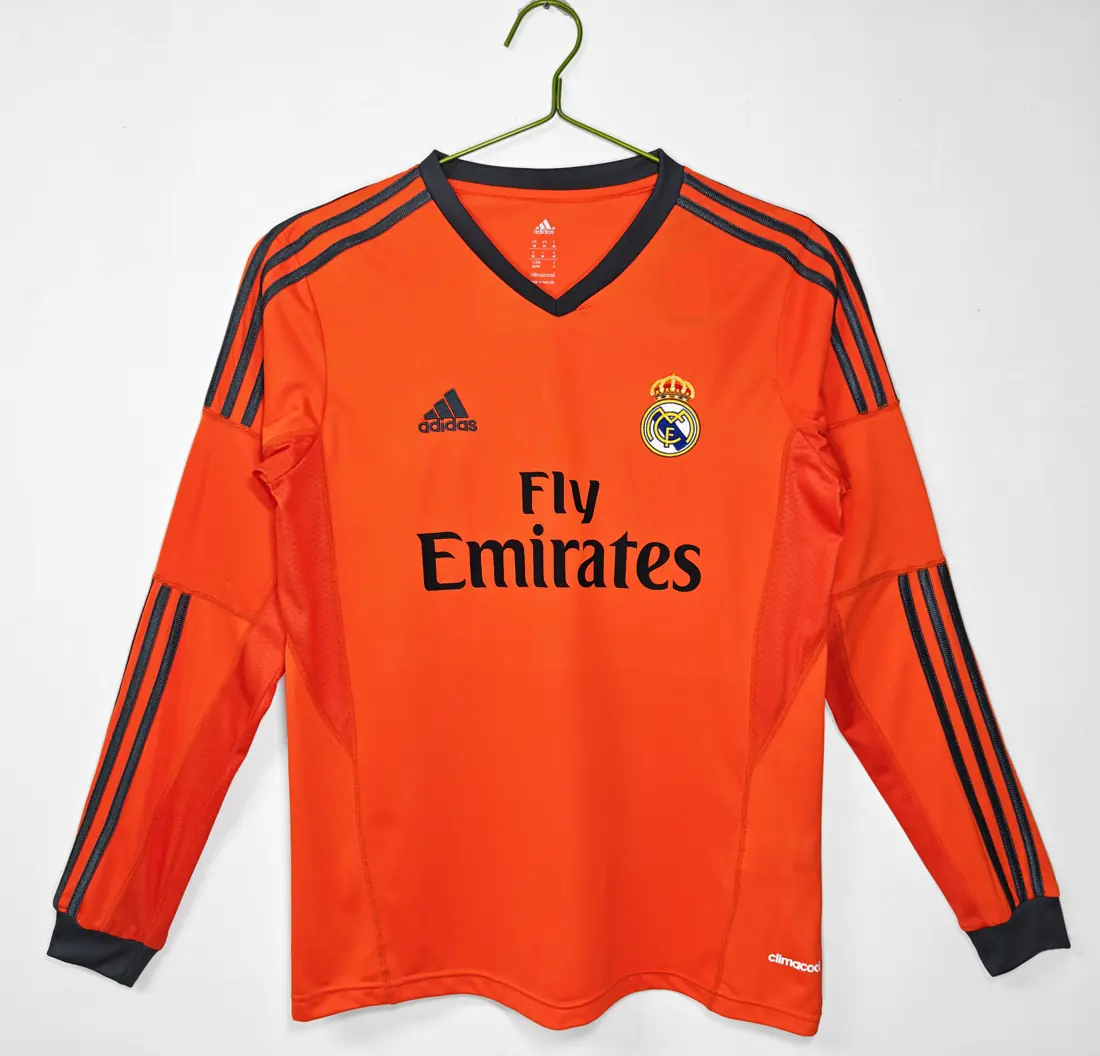Foto 1 de Manga larga: Temporada 2013/14 Real Madrid tercera naranja3B