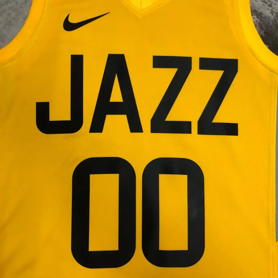 Foto 8 de Temporada 23 Jazz visitante amarillo número 00 Clarkson
