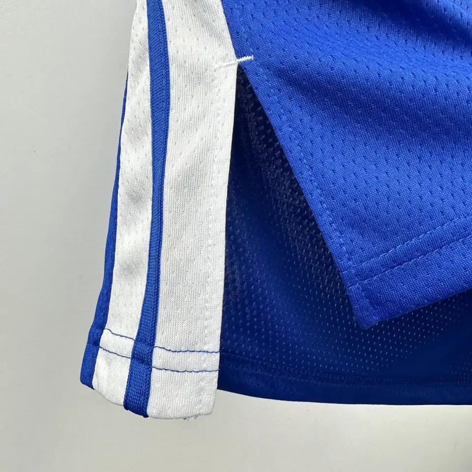 Foto 8 de Temporada 2023 Warriors azul con cuello en V número 10 Butler