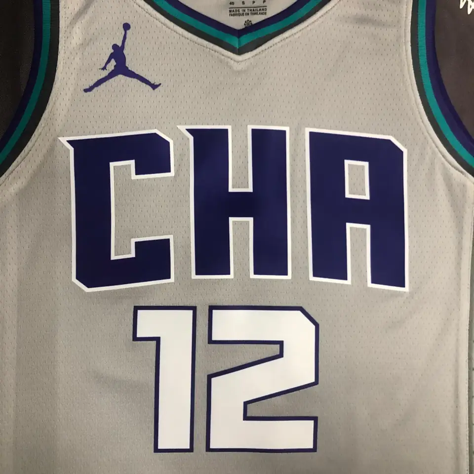Foto 7 de Temporada 19 Hornets gris número 12 Oubre