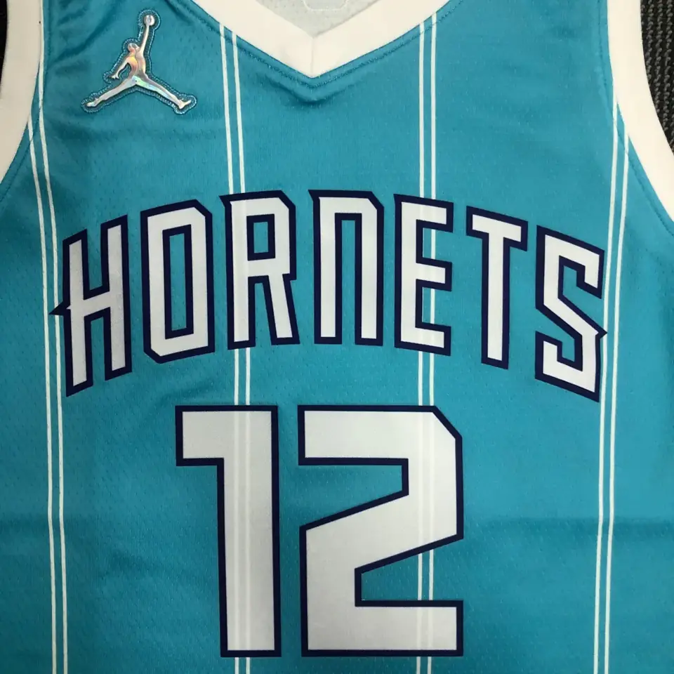 Foto 6 de 75 aniversario Hornets azul número 12 Oubre
